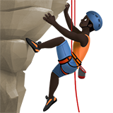 Чоловік піднімається по скелі: дуже темний тон шкіри для Apple iOS 18.4