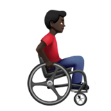 Мужчина в ручном инвалидном кресле смотрит вправо: темный оттенок кожи для Apple iOS 18.4