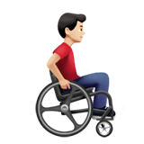 Мужчина в ручном инвалидном кресле смотрит вправо: светлый тон кожи для Apple iOS 18.4