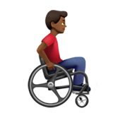 Мужчина в ручном инвалидном кресле смотрит вправо: средне-темный тон кожи для Apple iOS 18.4