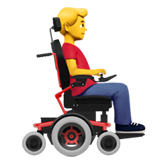 Чоловік у моторизованому інвалідному візку дивиться праворуч для Apple iOS 18.4