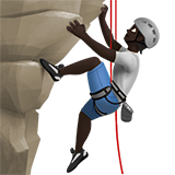 Людина піднімається по скелі: дуже темний тон шкіри для Apple iOS 18.4