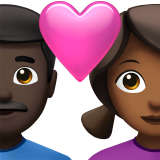 <p>Couple With Heart - Uomo: Tonalità di Pelle Scura, Donna: Tonalità di Pelle Media-Scura</p> per Apple iOS 26.4