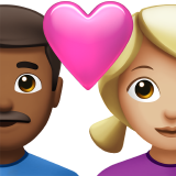 Casal com coração - Homem: Tom de pele médio-escuro, Mulher: Tom de pele médio-claro para Apple iOS 26.4