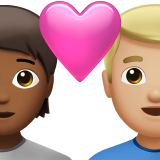 Pasangan Dengan Hati: Orang, Pria, Warna Kulit Sedang-Gelap, Warna Kulit Sedang-Terang untuk Apple iOS 26.4
