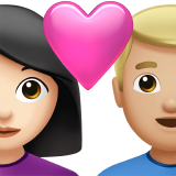 Cặp đôi với trái tim: phụ nữ, đàn ông, màu da sáng, màu da sáng trung bình cho Apple iOS 26.4