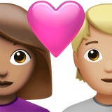 Casal com coração: mulher, pessoa, tom de pele médio, tom de pele médio-claro para Apple iOS 26.4