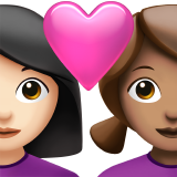 Couple with Heart: Woman, Woman, Light Skin Tone, Medium Skin Tone for Apple iOS 26.4