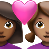 Cặp đôi với trái tim: phụ nữ, phụ nữ, màu da tối trung bình, màu da trung bình cho Apple iOS 26.4