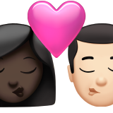 Kiss: Woman, Man, Dark Skin Tone, Light Skin Tone for Apple iOS 26.4