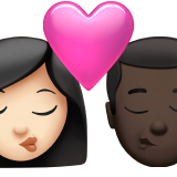 Kiss: Woman, Man, Light Skin Tone, Dark Skin Tone for Apple iOS 26.4