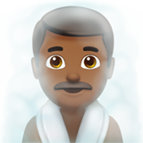 Mężczyzna w zaparowanym pomieszczeniu: karnacja średnio ciemna dla Apple iOS 26.4