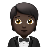 Persoon in smoking: donkere huidskleur voor Apple iOS 26.4