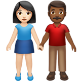 Woman and Man Holding Hands: Light Skin Tone, Medium-Dark Skin Tone for Apple iOS 26.4