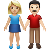 Woman and Man Holding Hands: Medium-Light Skin Tone, Light Skin Tone for Apple iOS 26.4
