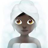 Woman in Steamy Room: Dark Skin Tone for Apple iOS 26.4