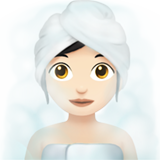 Wanita di ruangan beruap: warna kulit cerah untuk Apple iOS 26.4