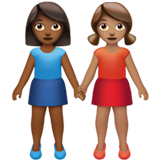 Women Holding Hands: Medium-Dark Skin Tone, Medium Skin Tone for Apple iOS 26.4