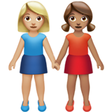 Vrouwen hand in hand: lichtgetinte huidskleur, getinte huidskleur voor Apple iOS 26.4