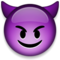 Rosto Sorridente Com Chifres