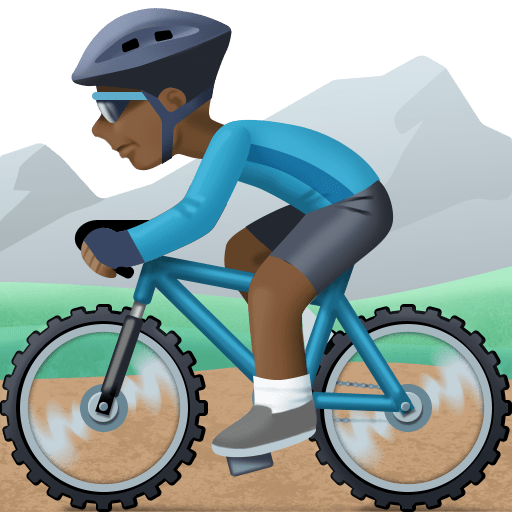 Pessoa Fazendo Mountain Bike: Tom de Pele Escuro