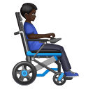 Homem em cadeira de rodas motorizada virado para a direita: tom de pele escuro para Huawei HarmonyOS 5.0