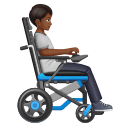 Pessoa em cadeira de rodas motorizada voltada para a direita: tom de pele médio-escuro para Huawei HarmonyOS 5.0