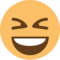 Šklebící se mžourající obličej