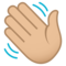 Winkende Hand: Mittelhelle Hautfarbe