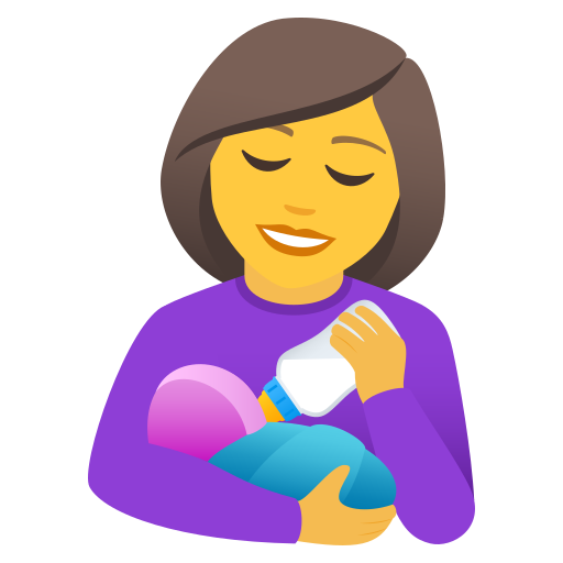 Frau füttert Baby