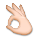 Mano con el signo OK girada