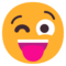 Показывает язык и подмигивает