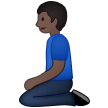 Kniender Mann: Dunkle Hautfarbe