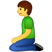 Kniende Person