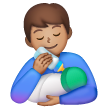 Homme Nourrissant Un Bébé: Peau Moyenne Homme Nourrissant Un Bébé: Peau Moyenne