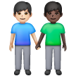 Deux Hommes Se Tenant La Main: Peau Claire, Peau Foncée Deux Hommes Se Tenant La Main: Peau Claire, Peau Foncée