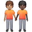Deux Personnes Se Tenant La Main: Peau Moyenne, Peau Foncée Deux Personnes Se Tenant La Main: Peau Moyenne, Peau Foncée