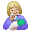 Femme Nourrissant Un Bébé: Peau Moyennement Claire Femme Nourrissant Un Bébé: Peau Moyennement Claire