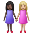 Deux Femmes Se Tenant La Main: Peau Foncée, Peau Moyennement Claire Deux Femmes Se Tenant La Main: Peau Foncée, Peau Moyennement Claire