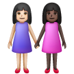 Deux Femmes Se Tenant La Main: Peau Claire, Peau Foncée Deux Femmes Se Tenant La Main: Peau Claire, Peau Foncée