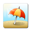Parasol plażowy wbity w ziemię