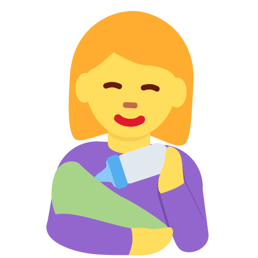 Frau füttert Baby