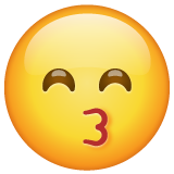 मुस्काती आँखो के साथ चुंबन वाला चेहरा