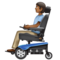 Personne En Fauteuil Roulant Motorisé: Peau Moyennement Foncée
