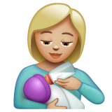 Femme Nourrissant Un Bébé: Peau Moyennement Claire